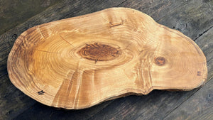 London plane serving board with orange highlights